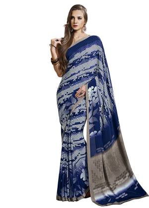 For Your Casuals Or Semi-Casuals, Grab This Light Weight Printed?Saree Fabricated On Crepe. Its Fabric IS Soft Towards Skin And Ensures Superb Comfort All Day Long. Buy Now.