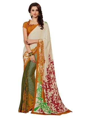Add Some Casuals With This Pretty Saree Fabricated On Crepe. This?Saree And Blouse are Beautified With prints And It Is Light Weight And Easy To Carry All Day Lon