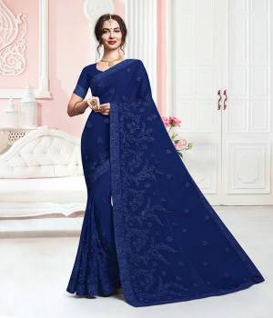 Bright And Appealing Color Is Here With This Designer Georgette Based Saree In Royal Blue Color. This Pretty Tone To Tone Embroidered Saree Is Light Weight And Easy To Carry Throughout The Gala.