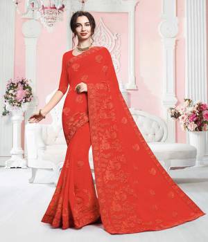 Here Is A Very Beautiful And Elegant Looking Tone Tone Embroidered Saree In Red Color. This Saree Is Fabricated On Georgette Which Is Light In Weight And Durable. Buy This Designer Saree Now.