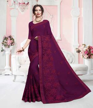 Here Is A Very Beautiful And Elegant Looking Tone Tone Embroidered Saree In Purple Color. This Saree Is Fabricated On Georgette Which Is Light In Weight And Durable. Buy This Designer Saree Now.