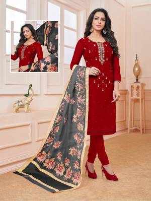 Enhance Your Personality Wearing This Designer Straight Suit In Maroon Color Paired With Contrasting Grey Colored Dupatta. Its Embroidered Top Is Fabricated On Modal Silk Paired With Cotton Bottom And Cotton Silk Fabricated Dupatta. 