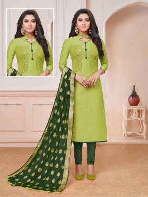 Look Pretty Wearing This Designer Straight Suit In Light Green Color Paired With Dark Green Colored Bottom And Dupatta. Its Top Is Fabricated On Modal Silk Paired With Cotton Bottom And Banarasi Art Silk Weaved Dupatta. Buy Now.