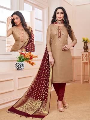 Flaunt Your Rich And Elegant Taste Wearing This Designer Straight Suit In Beige Color Paired With Maroon Colored Bottom And Dupatta. Its Top IS Fabricated On Linen Satin Paired With Cotton Bottom And Banarasi Art Silk Dupatta. Buy This Dress Material Now.