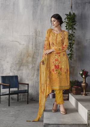 Look Pretty Wearing This Designer Suit In Musturd Yellow Color. Its Top Is Fabricated On Georgette Paired With Santoon Bottom And Chiffon Fabricated Dupatta. Its Top Is Beautified With Digital Prints And Lakhnavi Work. Buy Now.