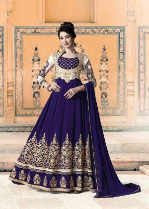 Get Ready For The Upcoming Festive And Wedding Season With This Heavy Designer Floor Length Suit In Royal Blue Color. Its Heavy Embroidered Top Is Fabricated On Georgette Paired With Santoon Bottom and Chiffon Fabricated Dupatta. All Its Fabrics Ensures Superb Comfort Throughout The Gala. Buy Now.