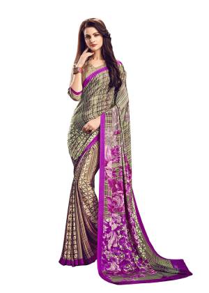For Your Casuals Or Semi-Casuals, Grab This Light Weight Printed?Saree Fabricated On Crepe. Its Fabric IS Soft Towards Skin And Ensures Superb Comfort All Day Long. Buy Now