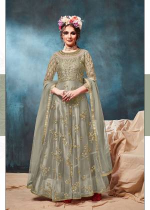 Get Ready For The Upcoming Wedding And Festive Season With This Heavy Designer Floor Length Suit In Mint Green Color. Its Heavy Embroidered op Is Fabricated On Net Paired With Santoon Bottom And Net Fabricated Dupatta. Buy Now.