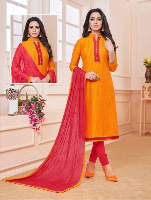 Add Some Semi-Casuals To Your Wardrobe With This Designer Straight Suit In Orange Colored Top Paired With Contrasting Dark Pink Colored Bottom And Dupatta. This Dress Material IS Cotton Based Paired With Chiffon Fabricated Embroidered Dupatta. Buy Now.