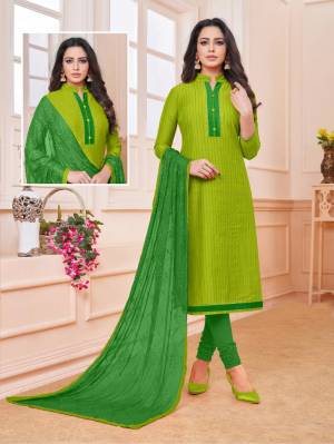 Add Some Semi-Casuals To Your Wardrobe With This Designer Straight Suit In Parrot Green Colored Top Paired With Green Colored Bottom And Dupatta. This Dress Material IS Cotton Based Paired With Chiffon Fabricated Embroidered Dupatta. Buy Now.
