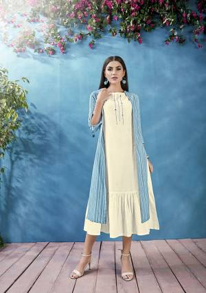 Pretty Elegant Looking Designer Readymade Kurti With Jacket Is Here In White And Blue Color. This Pretty Thread Embroidered Kurti Is Fabricated On Cotton Paired With Handloom Cotton Fabricated Printed Jacket. 