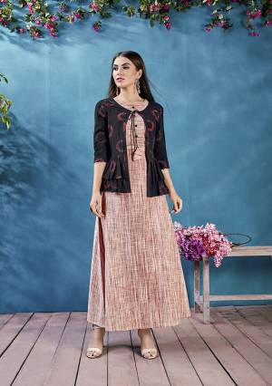 New And Unique Styled Readymade Long Kurti Is Here In Rust Color Paired With Black Colored Peplum Patterned Jacket. This Pair Of Kurti And Jacket Are Fabricated On Handloom Cotton Beautified With Prints. 
