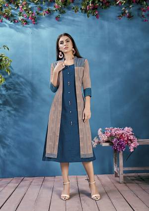 Simple And Elegant Yet Stylish Looking Readymade kurti With Jacket Is Here In Blue And Sand Grey Color. This Pretty Kurti And Jacket are Cotton Based Which IS Light Weight, Durable And Ensures Superb Comfort All Day Long. 