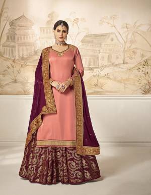 Flaunt Your Rich And Elegant Taste Wearing This Designer Indo-Western Suit In Dark Peach Colored Top Paired With Contrasting Magenta Pink Colored Bottom And Dupatta. Its Embroidered Top Is Fabricated On Satin Silk Paired With Jacquard Silk Bottom And Georgette Silk Fabricated Dupatta. As Per Your Choice You Can Its Bottom Stitched As A Plazzo Or Skirt. 