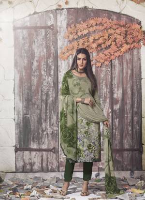 Beat The Heat This Summer Wearing This Simple and Elegant looking Printed Straight Suit In Olive Green Color. This Dress Material Is Fabricated On Crepe Paired With Georgette Fabricated Dupatta. Buy This Pretty Digital Printed Suit Now.