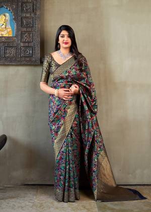Grab This Beautiful And Attractive Looking Saree In Royal Blue Color Paired With Royal Blue And Gold Blouse. This Saree And Blouse are Fabricated On Banarasi Art Silk Beautified With Weave All Over. 