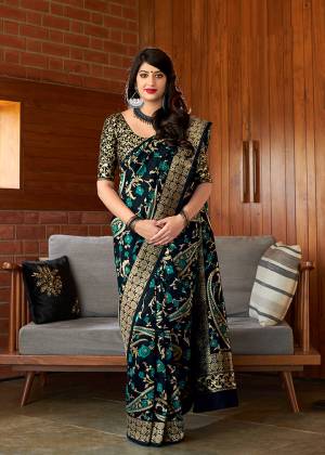 Here Is A Bold And Beautiful Looking Designer Silk Based Saree In Black Color. This Saree And Blouse Are Fabricated on Banarasi art Silk Beautified With Bold Weave. 