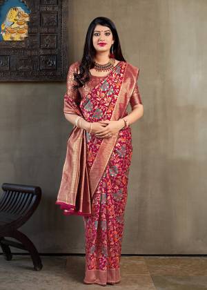 For A Royal Look, Grab This Designer Heavy Weaved Saree In Dark Pink Color Paired With Dark Pink And Gold Colored Blouse. This Saree And Blouse Are Fabricated On Banarasi Art Silk Which Gives Rich Look To Your Personality. 