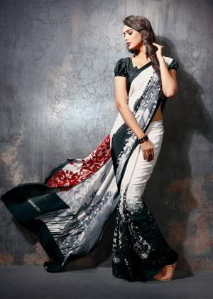 Add Some Casuals With This Pretty Saree Fabricated On Crepe. This Saree And Blouse are Beautified With prints And It Is Light Weight And Easy To Carry All Day Long?
