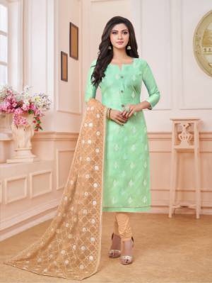 Celebrate This Festive Season Wearing This Designer Straight Suit In Light Green Colored Top Paired With Beige Colored Bottom And Dupatta. Its Top Is Fabricated On Modal Silk Paired With Cotton Bottom And Net Fabricated Dupatta. Its Top And Dupatta Are Beautified With Embroidery. Buy Now.