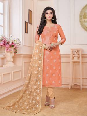Celebrate This Festive Season Wearing This Designer Straight Suit In Orange Colored Top Paired With Beige Colored Bottom And Dupatta. Its Top Is Fabricated On Modal Silk Paired With Cotton Bottom And Net Fabricated Dupatta. Its Top And Dupatta Are Beautified With Embroidery. Buy Now.