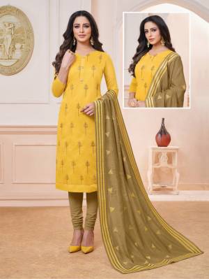 For Your Semi-Casuals, Grab This Designer Straight Suit In Yellow Colored Top Paired With Contrasting Olive Green Colored Bottom And Dupatta. Its Top IS Modal Silk Based Paired With Cotton Bottom And Chiffon Fabricated Dupatta. 