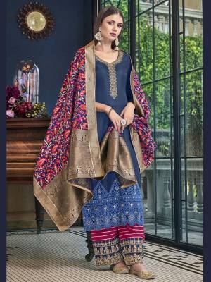 Grab This Beautiful Designer Season Suitable For This Festive Season In Dark Blue Colored Top Paired With Contrasting Magenta Pink Colored Bottom And Multi Colored Dupatta. Its Top Is Satin Silk Based Paired With Jacquard Silk Bottom And Dupatta. 