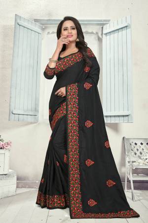 Grab This Heavy Embroidered Saree In Black Color. This Saree And Blouse Are fabricated on Art Silk Beautified With Multi Colored Kashmiri Embroidery. This Pretty Saree Gives A Rich Look And It Is Suitable For Wedding And Festive Season. Buy Now.