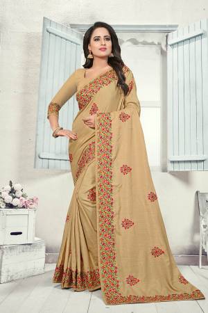 Grab This Heavy Embroidered Saree In Beige Color. This Saree And Blouse Are fabricated on Art Silk Beautified With Multi Colored Kashmiri Embroidery. This Pretty Saree Gives A Rich Look And It Is Suitable For Wedding And Festive Season. Buy Now.