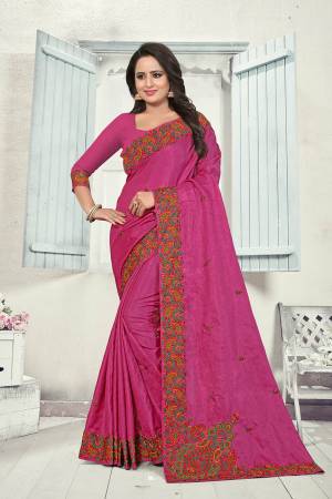 Grab This Heavy Embroidered Saree In Magenta Pink Color. This Saree And Blouse Are fabricated on Art Silk Beautified With Multi Colored Kashmiri Embroidery. This Pretty Saree Gives A Rich Look And It Is Suitable For Wedding And Festive Season. Buy Now.