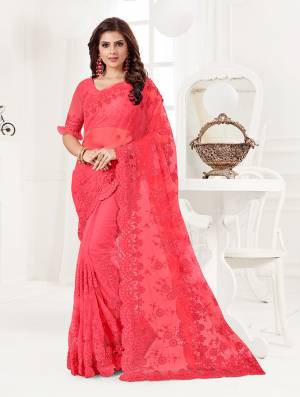 Here Is A Very Beautiful And Heavy Designer Saree In Dark Pink Color. This Beautiful Heavy Embroidered Saree And Blouse Are Fabricated On Net Beautified With Pretty Tone To Tone Resham Embroidery And Ceramic Stone Work. Buy This Heavy Yet Subtle Looking Saree Now.