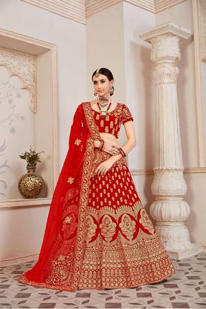 Get Ready For Your D-Day With This Heavy Designer Lehenga Choli In All Over Red Color. This Heavy Embroidered Lehenga Choli Is Fabricated On Velvet Paired With Net Fabricated Dupatta. It Is Beautified With Heavy Coding Jari Embroidery. Buy This Bridal Leh