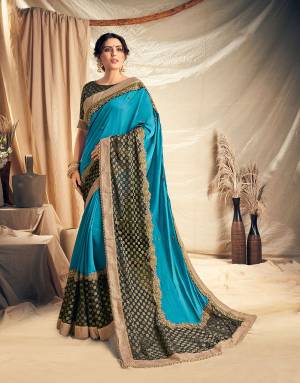 Look regal and elegant in this vibrant and pronounced blue saree with sheer brocade weave border. Pair with subtle jewels to look magnificent. 