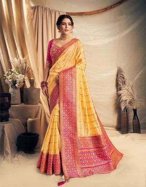 Glow like a morning sun and spread the festival cheer in this stunning yellow and pink saree. Adorn it with beautiful gold jewels to look like sunshine, 