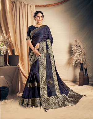 Look like  a modern day princess with regal choices and cultural inheritence in this stylish Navy blue saree. Pair with simple stud earrings and look wonderful. 
