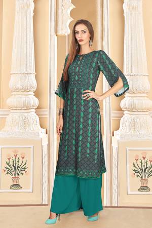 For Your Semi-Casuals, Grab This Designer Readymade Pair Of Kurti And Plazzo In Dark Grey And Teal Blue Color. This Pretty Pair Is Fabricated On Rayon Cotton. Its Pretty Kurti Is Beautified With Digital Prints. Buy Now.