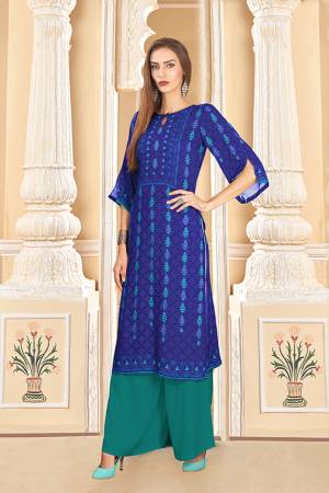 Grab This Beautiful Readymade Pair Of Kurti And Plazzo In Royal Blue And Teal blue Color. This Pair Is Rayon Cotton Based Beautified With Digital Prints Over The Kurti. 