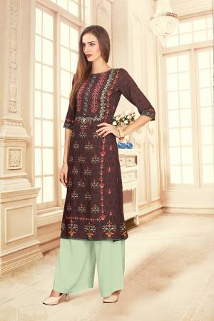 For Your Semi-Casuals, Grab This Designer Readymade Pair Of Kurti And Plazzo In Wine Maroon And Pastel Green Color. This Pretty Pair Is Fabricated On Rayon Cotton. Its Pretty Kurti Is Beautified With Digital Prints. Buy Now.