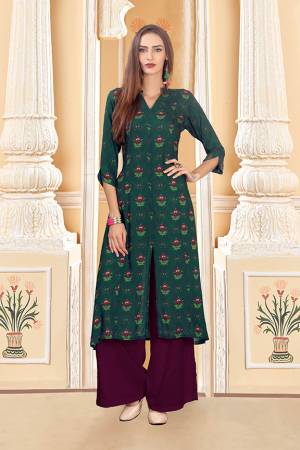 For Your Semi-Casuals, Grab This Designer Readymade Pair Of Kurti And Plazzo In Teal Green And Wine Color. This Pretty Pair Is Fabricated On Rayon Cotton. Its Pretty Kurti Is Beautified With Digital Prints. Buy Now.
