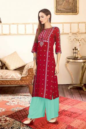 Grab This Beautiful Readymade Pair Of Kurti And Plazzo In Rani Pink And Aqua Blue Color. This Pair Is Rayon Cotton Based Beautified With Digital Prints Over The Kurti. 