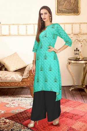 Beat The Heat This Summer With These Readymade Pair Of Kurti And Plazzo In Turquoise Blue And Black Color. This Kurti And Plazzo Are Fabricated on Rayon Cotton And Available In All Sizes, Choose As Per Your Desired Fit And Comfort. Buy Now.