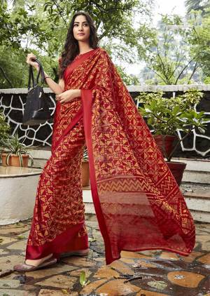 Adorn The Pretty Angelic Look Wearing This Designer Printed Saree In Red Color Paired With Red Colored Blouse. This Saree And Blouse Are Fabricated On Kota Brasso Beautified With Geometric Prints All Over. 