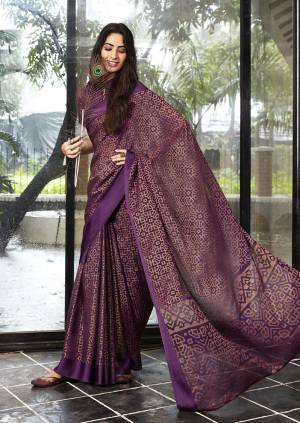 You Will Definitely Earn Lots Of Compliments Wearing This Designer Saree In Purple Color Paired With Purple Colored Blouse. This Saree And Blouse Are Fabricated On Kota Brasso. Its Rich Fabric And Pretty Color Will Earn You Lots Of Compliments From Onlookers. 