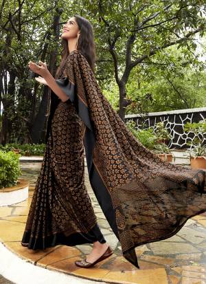 For A Bold And Beautiful Look, Grab This Designer Saree In Black Color Paired With Black Colored Blouse. This Saree And Blouse Are Fabricated On Kota Brasso Which Gives A Rich Look And Also It Is Durable And Easy To Care For. 