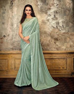 Look flawless in this beautiful Aqua Blue saree with tonal details and ornately embroidered blouse. Go for a stylish nivi drape to look mesmerizing. 