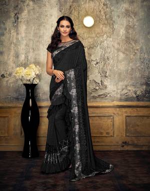 It's never too difficult to look like a bollywood diva. Opt for this extremely stylish and sassy black saree and appear like a celebrity . 