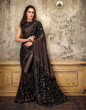 Go all bold and beautiful in this copper-ish saree and give your festive appearances a red-carpet look. Let the pallu fall free to flaunt that frill. 