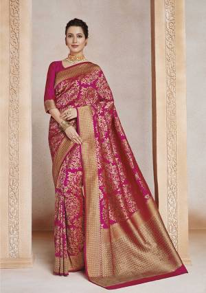 Enhance Your Personality Wearing This Designer Silk Based Saree In Dark Pink Color. This Saree And Blouse Are Fabricated On Soft Art Silk Beautified With Weave All Over. 