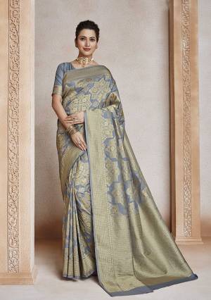 Celebrate This Festive Season In Traditional Look Wearing This Designer Saree In Grey Color . This Saree And Blouse Are Fabricated On Soft Art Silk Beautified With Weave All Over. It Is Light Weight, Durable And Easy To Carry All Day Long. 