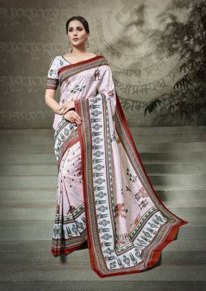 Simple And Elegant Looking Printed Saree Is Here In Baby Pink Color Paired With Off-White Colored Blouse. This Saree And Blouse Fabricated On Tussar Art Silk Beautified With Digital Prints All Over. 